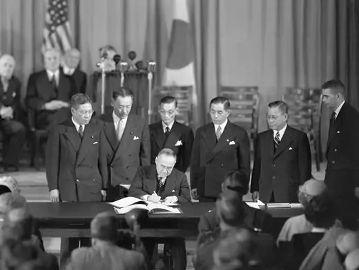 Japanese Prime Minister Shigeru Yoshida signs the Treaty of San Francisco with the United States on September 8, 1951.