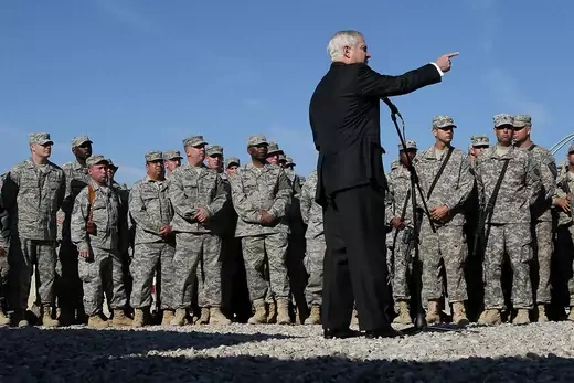 Secretary of Defense Robert Gates speaks in front of a line of soldiers