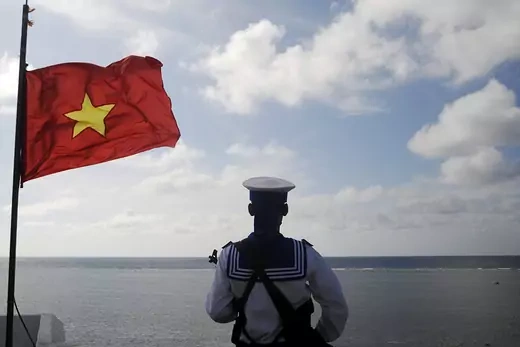 A Vietnamese seaman stands guard at Thuyen Chai Island in the Spratly archipelago.