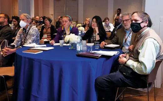Educators watch the CFR Education Presentation at the College and University Educators Workshop.