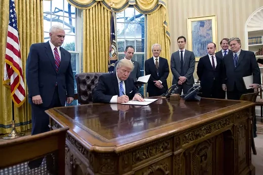 Trump signs an executive order withdrawing the United States from the Trans-Pacific Partnership.