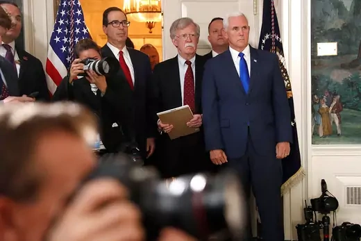 Treasury Secretary Steve Mnuchin, National Security Adviser John Bolton, and Vice President Mike Pence await remarks from Trump on the Iran nuclear accord.