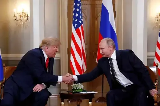 Trump and Putin shake hands at the Helsinki summit.