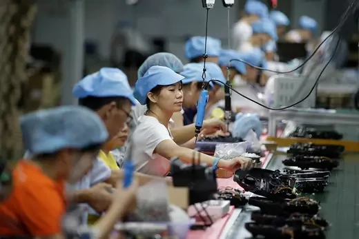 Workers on the production line of a factory in Shenzhen, China.