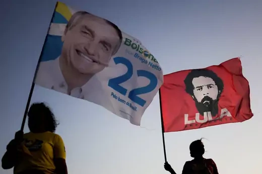 Supporters of Brazil's President and candidate for re-election Jair Bolsonaro and supporters of Brazil's former President Luiz Inacio Lula da Silva campaign together on a street during an election campaign in Brasilia, Brazil 