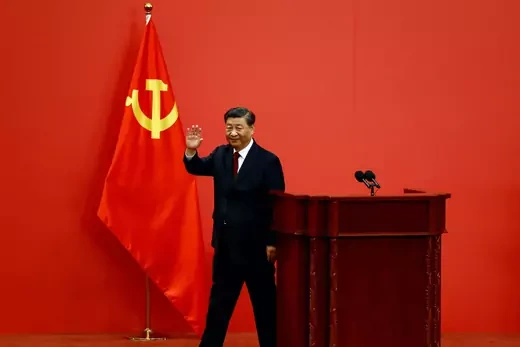 Chinese President Xi Jinping waves after his speech as the new Politburo Standing Committee members meet the media following the 20th National Congress of the Communist Party of China, at the Great Hall of the People in Beijing, China October 23, 2022.