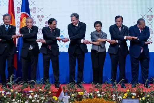 U.S. Secretary of State Antony Blinken and others do the "ASEAN-way handshake" for a group photo during the U.S.-ASEAN ministerial meeting in Phnom Penh, Cambodia on August 4, 2022.
