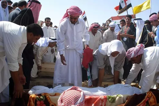 Iraqi Sunni tribesmen bury their leader, Sheikh Abdul Sattar Abu Risha and three of his bodyguards.