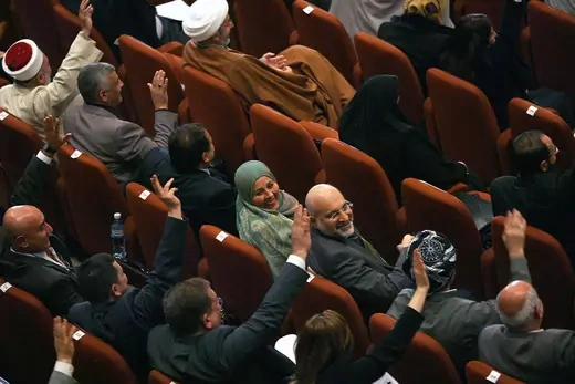Iraqi MPs vote in parliament.
