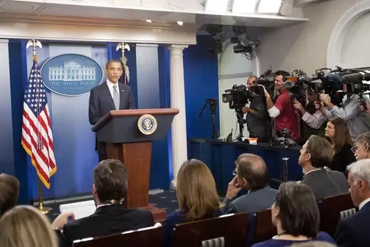 U.S. President Barack Obama speaks during a news conference in Washington, D.C. as reporters listen.