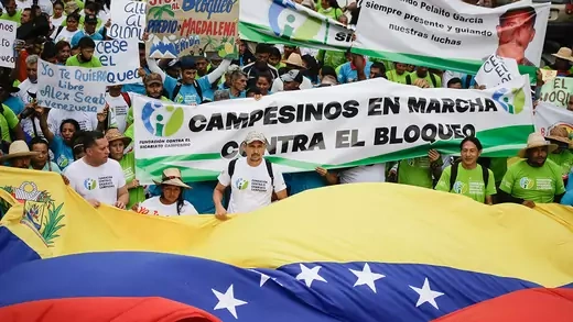 Venezuelan peasant farmers protest against economic sanctions in front of UN headquarters in Caracas.