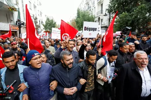Supporters of Tunisian opposition groups protest against the upcoming parliamentary election in Tunisia