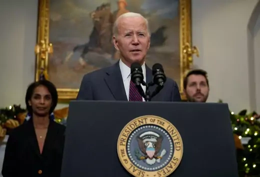 Flanked by Chair of the Council of Economic Advisers Cecilia Rouse (L) and Director of the National Economic Council Brian Deese (R), U.S. President Joe Biden speaks in the Roosevelt Room of the White House December 13, 2022 in Washington, DC.