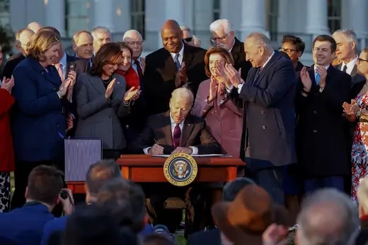 U.S. President Joe Biden signs the Infrastructure Investment and Jobs Act on the South Lawn at the White House in Washington, U.S. November 15, 2021.