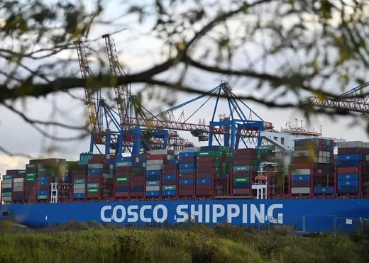 Cargo ship 'Cosco Shipping Gemini' of Chinese shipping company 'Cosco' is loaded at the container terminal 'Tollerort' in the port in Hamburg, Germany, October 25, 2022.