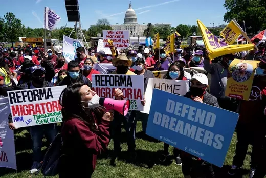Pro-immigration activists call for immigration reform in Washington on May 1, 2021