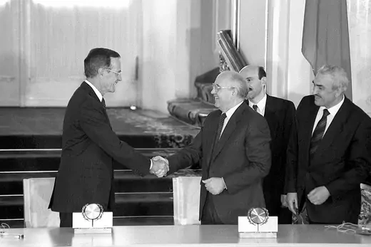 U.S. President George H.W. Bush and Soviet leader Mikhail Gorbachev shake hands at the signing of the START agreement. 