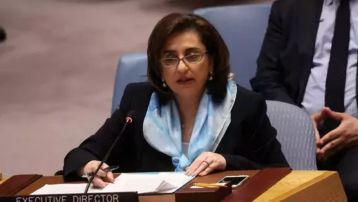 Sima Bahous speaking into a mic during a UN Security Council meeting.