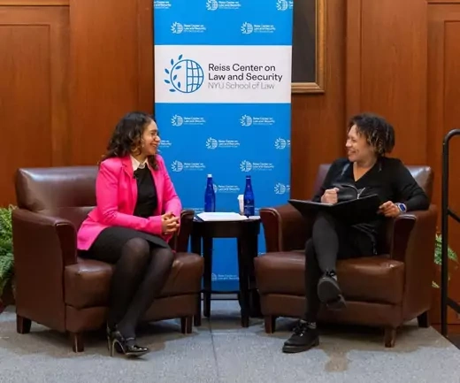 Special Representative for Racial Equity and Justice, Desiree Cormier Smith sits on the left, in conversation with Catherine Powell on the right, seated at an event at NYU School of Law.