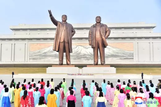 People pay their respects to late North Korean leaders Kim Il Sung and Kim Jong Il at Mansu Hill Grand Monument in Pyongyang, North Korea in this image released on March 9, 2023 by North Korea's Korean Central News Agency.