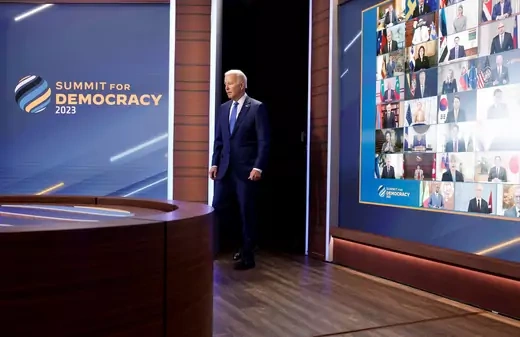 U.S. President Joe Biden arrives to deliver remarks during a virtual Summit for Democracy.