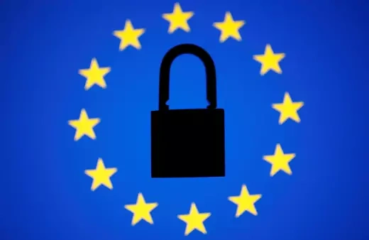 A padlock sits in the center of European Union flag.