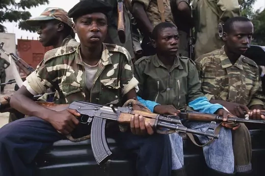 Soldiers loyal to Laurent Kabila’s Alliance of Democratic Forces for the Liberation of Congo (AFDL) brandish their weapons.