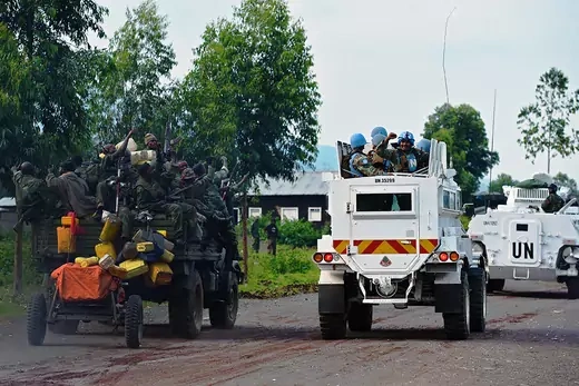 Congolese forces and members of the UN Force Intervention Brigade celebrate during a mission near Goma. 