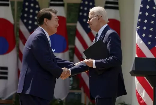 U.S. President Joe Biden and South Korean President Yoon Suk-yeol shake hands at the conclusion of a joint news conference in the Rose Garden of the White House on April 26, 2023.