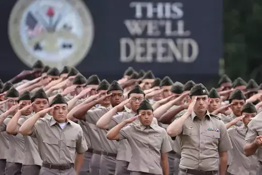New U.S. Army trainees in a line as seen saluting.