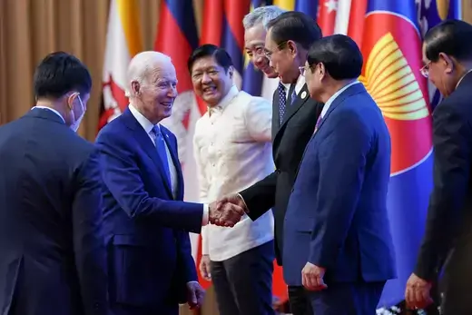 U.S. President Joe Biden shakes hands with ASEAN leaders.