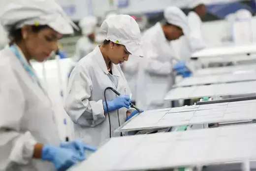 Employees work on a solar energy panel of Chinese solar equipment manufacturer BYD in Campinas, Brazil February 13, 2020.