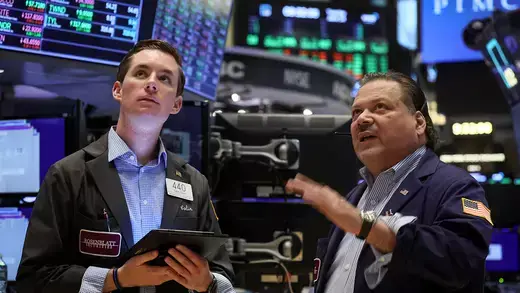 two traders on new york stock exchange