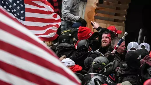 Supporters of U.S. President Donald Trump clash with police at the  Capitol building.