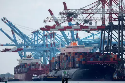 Docked cargo ships are loaded with shipping containers at Port Elizabeth, New Jersey, United States, July 12, 2023.