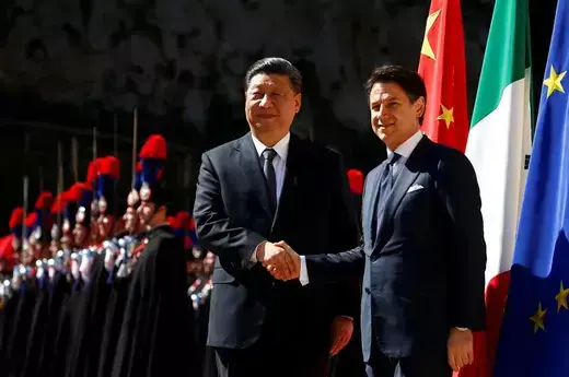 Former Italian Prime Minister Giuseppe Conte greets Chinese President Xi Jinping before a meeting in Rome, Italy in March, 2019.