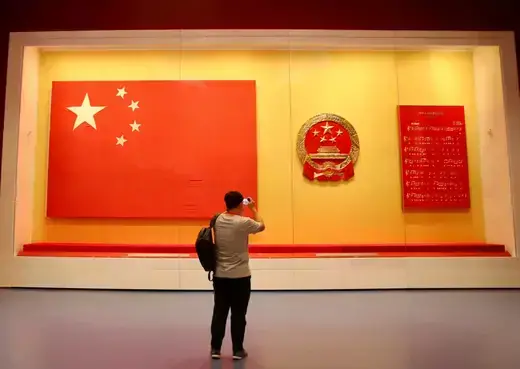 A visitor views an exhibition at the Museum of the Communist Party of China on June 25, 2021 in Beijing, China
