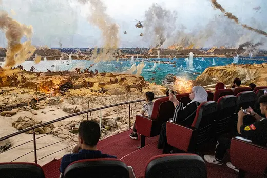 Egyptians view  a recreated war scene at museum and memorial of the October War in Cairo.