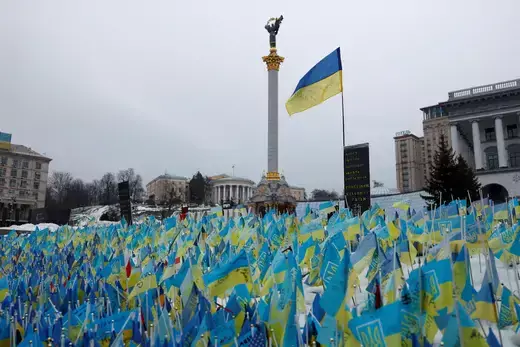 Flags representing fallen soldiers, including foreign soldiers, are seen in the snow on Independence Square, as Russia's attack on Ukraine continues, in Kyiv, Ukraine, on December 22, 2022.