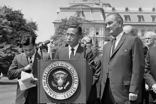South Korean President Park Chung-hee stands on a podium next to U.S. President Lyndon B. Johnson in Washington, DC.