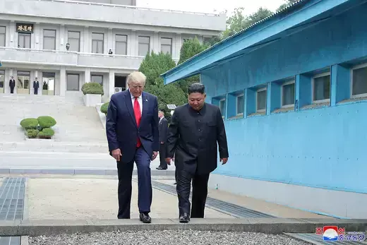 U.S. President Donald Trump and North Korean leader Kim Jong Un cross over the military demarcation line separating the two Koreas in Panmunjon.