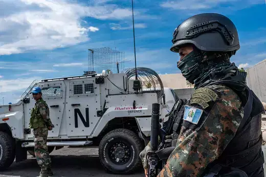 A peacekeeper of the United Nations Organization Stabilization Mission in the Democratic Republic of the Congo (MONUSCO) looks on at the force's base during a field training exercise in Sake, eastern Democratic Republic of Congo. 
