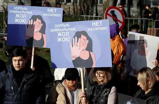  People, including activists of Zhana Adamdar (New People) youth movement, hold a rally under the slogan "Say no to the beast world" to support women's rights and to condemn gender-based domestic violence in Almaty, Kazakhstan, November 26, 2023. One of the slogans on placards reads: "No to violence!"