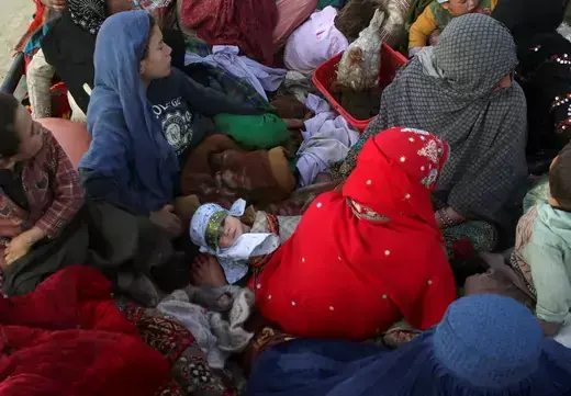 Afghan women and children travel on a truck while heading back to Afghanistan, after Pakistan gave a final warning to undocumented immigrants to leave, at the Friendship Gate of Chaman Border Crossing along the Pakistan-Afghanistan Border in Balochistan Province, in Chaman, Pakistan November 4, 2023. 