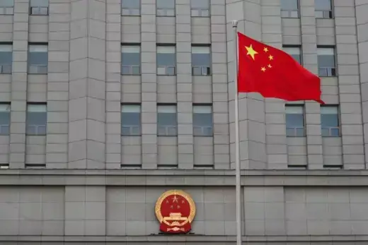 A Chinese flag waves outside Beijing No. 2 Intermediate People's Court in Beijing, China.