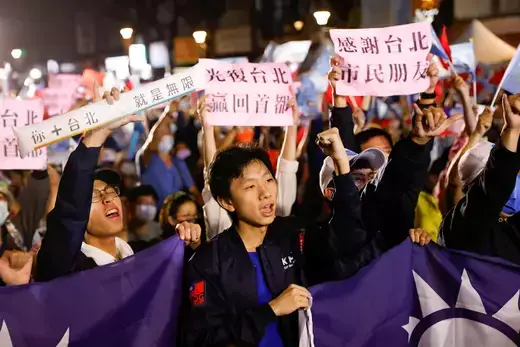 Supporters of the opposition party Kuomintang (KMT) celebrate the preliminary results of the local elections during a rally in Taipei, Taiwan.
