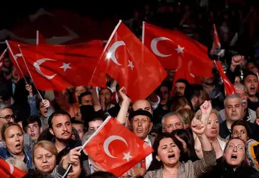 Supporters of the main opposition Republican People's Party (CHP) wave Turkish flags during a gathering to protest after the High Election Board (YSK) decided to re-run the mayoral election
