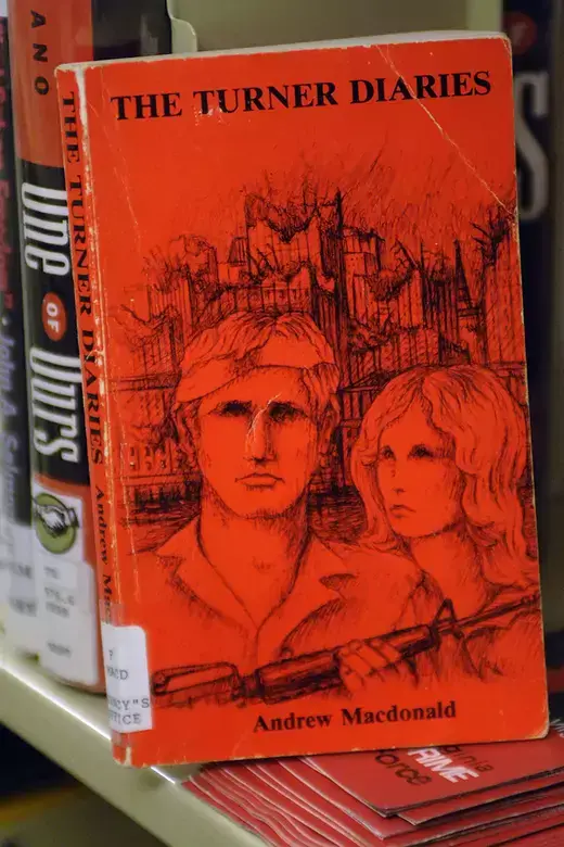 A copy of ‘The Turner Diaries,’ a racist, dystopian novel, sits on a library shelf in Marlinton, West Virginia.