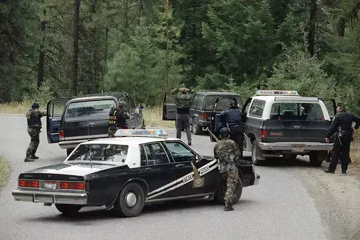 Federal agents draw their weapons on five neo-Nazis a few miles from the Ruby Ridge site in Idaho where Randy Weaver is engaged in a standoff with authorities.