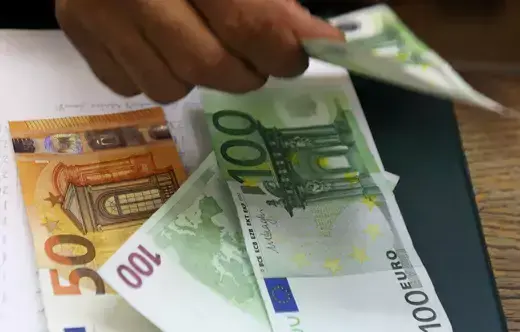 Euro banknotes at a money exchange office.